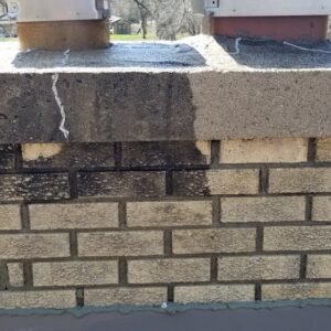 Photo of brick pavers mostly restored showing before and after