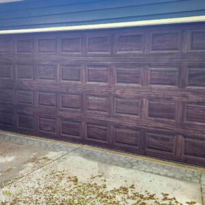 Photo of a garage door after soft power washing cleaning