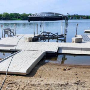 Photo of a cleaned floating platform on a lake after power washing