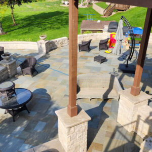 Photo of a large outdoor living area brick paver patio after being power washed